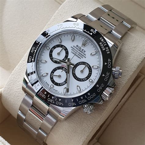 rolex daytona white dial black bezel|Rolex daytona platinum diamond dial.